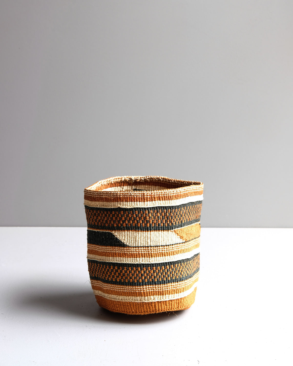 Tamaduni: Earthy geometric fine weave sisal basket