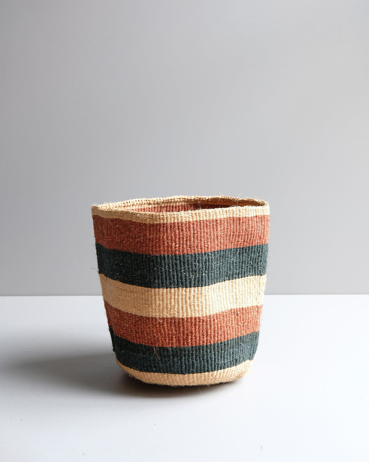 Tupu: Striped hand woven sisal basket