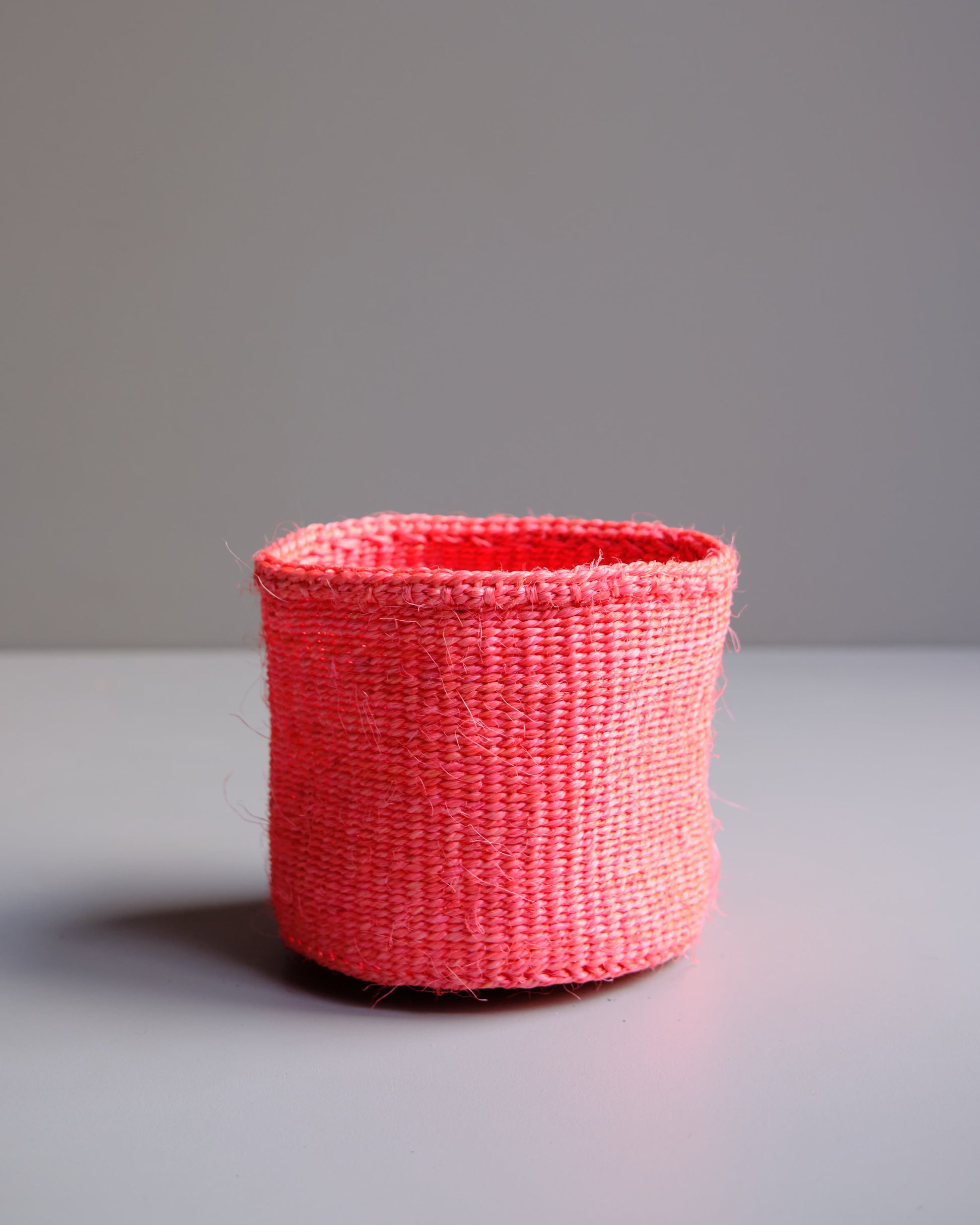 Vivid Pink hand woven Kenyan sisal basket